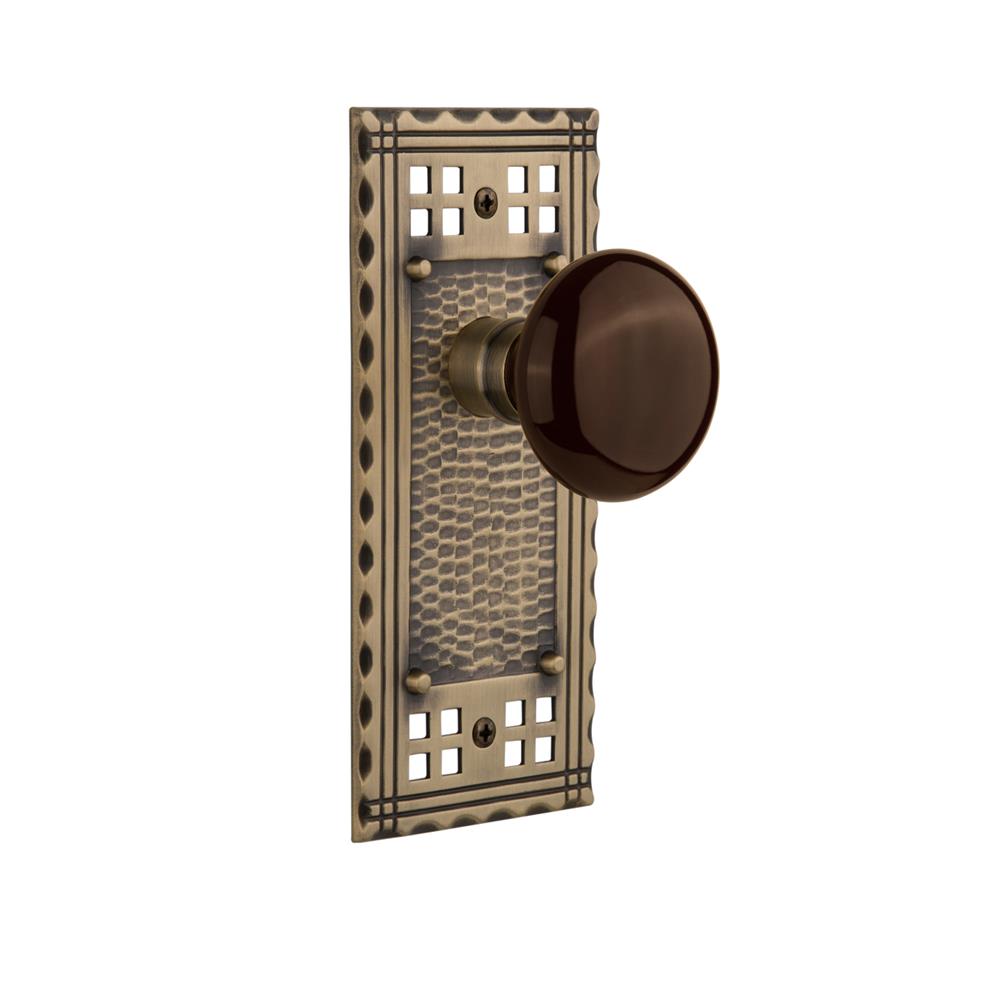 Nostalgic Warehouse CRABRN Privacy Knob Craftsman Plate with Brown Porcelain Knob in Antique Brass